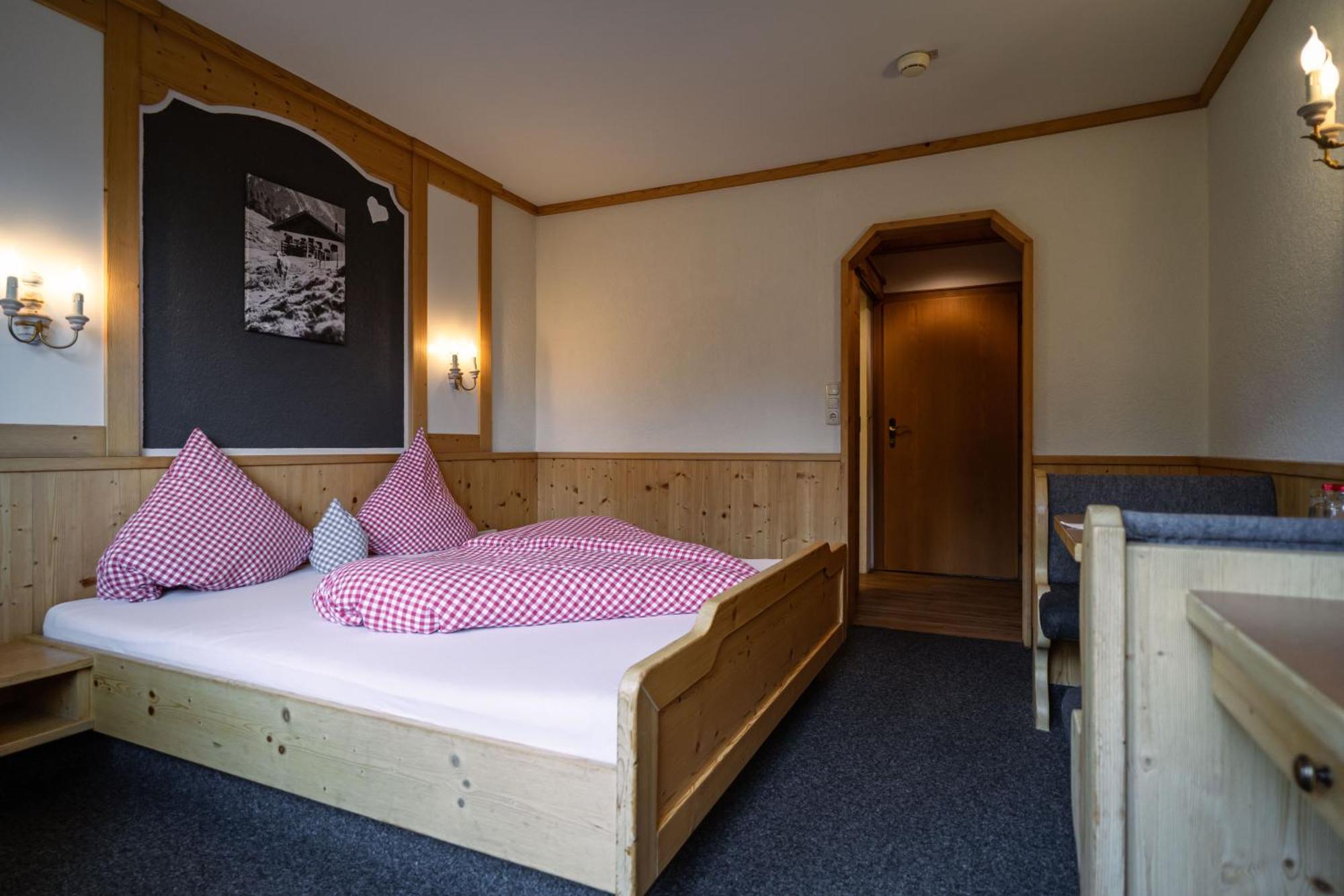 Hotel Landhaus Tirolerherz Sankt Ulrich am Pillersee Rom bilde